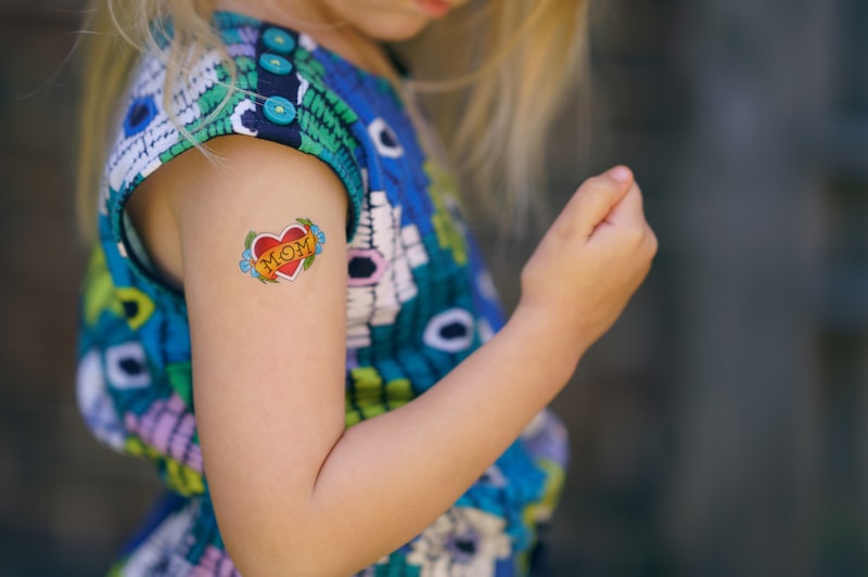 Fine-line heart semi-permanent tattoo